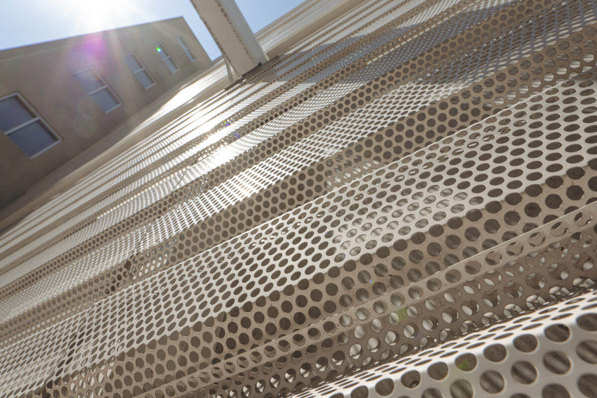 Closeup of Perforated metal siding at Chicago Fashion Outlets