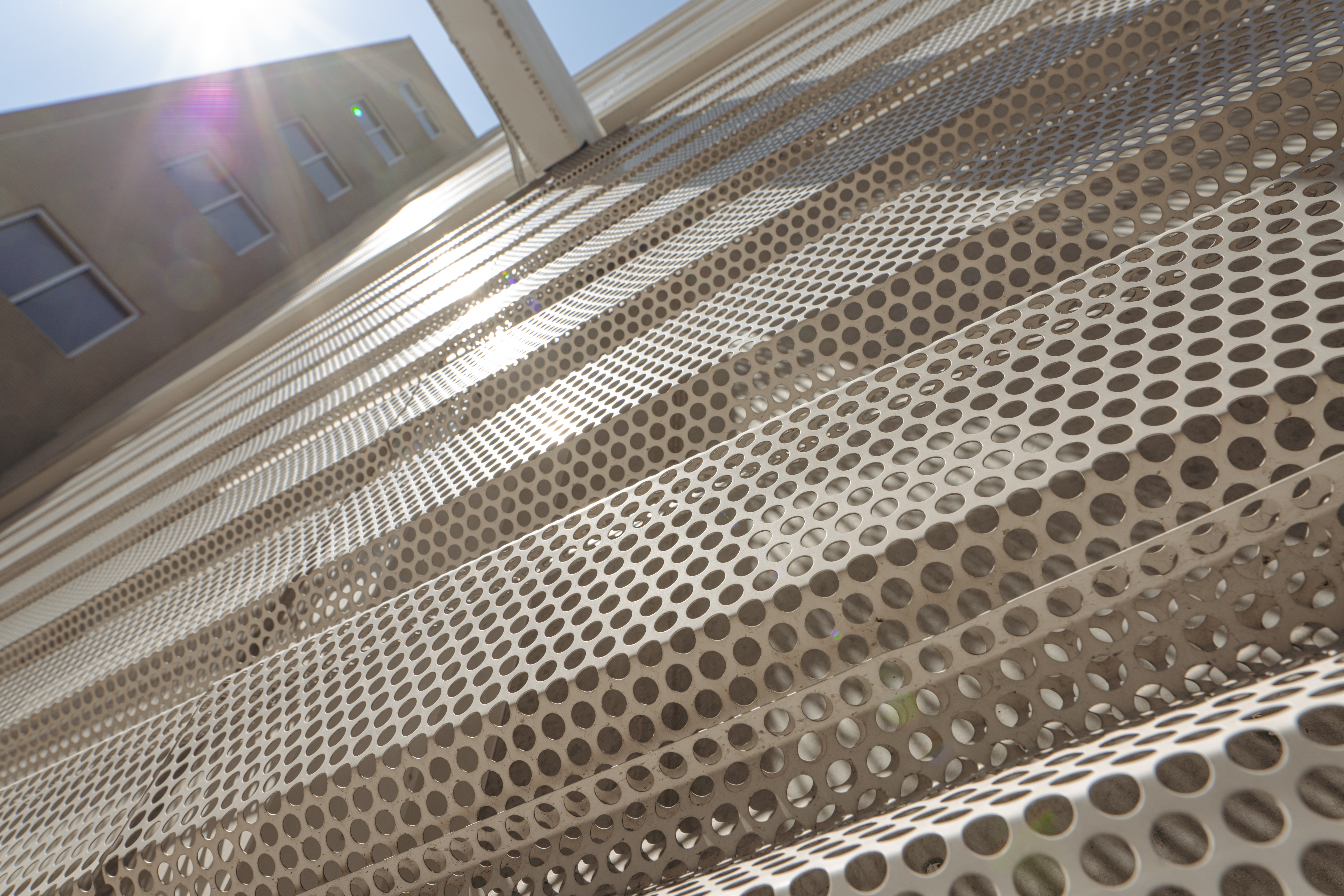 Closeup of Perforated metal siding at Chicago Fashion Outlets