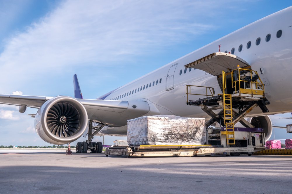 Air,Cargo,Logistic,Containers,Are,Loading,To,An,Airplane.,Air